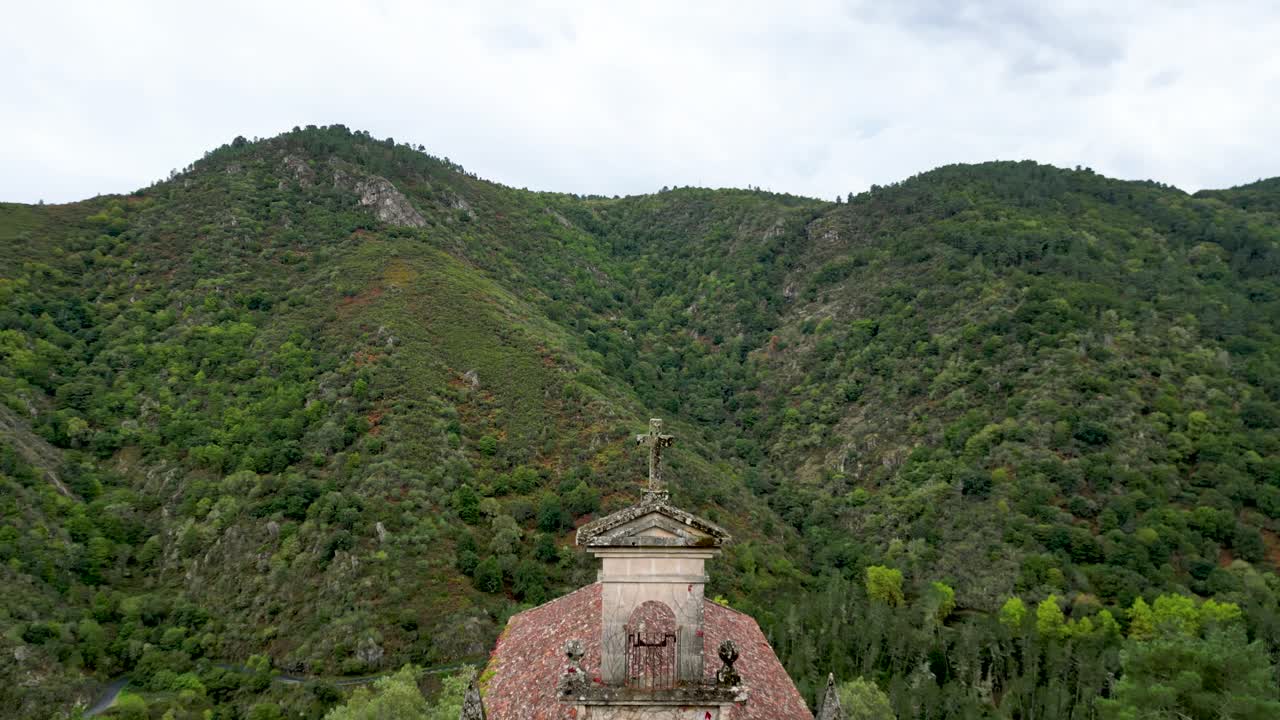 Epic aerial pullback of church in sil river canyon, pant&oacute;n in the ribeira sacra, lugo, spain