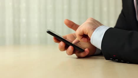 Businessman-Using-Mobile-Phone-3