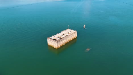 Drone-Footage-of-an-underwater-temple-in-a-lake-in-thailand