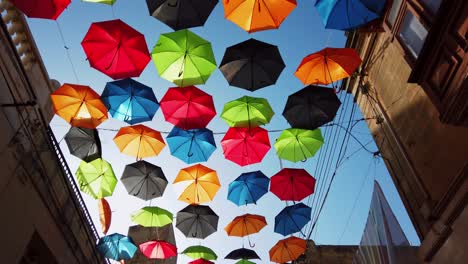 malta, zabbar, walking in umbrella street.