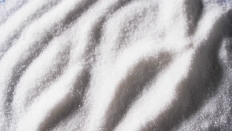 video of close up of white sand grains with pattern and copy space background