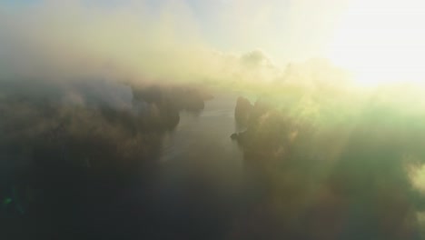 an aerial view shows khao sok national park in surat thani thailand through the haze of clouds