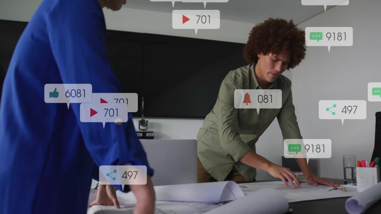 Working on documents, two people with animation of social media notifications