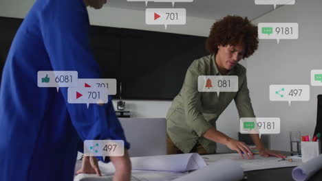 working on documents, two people with animation of social media notifications