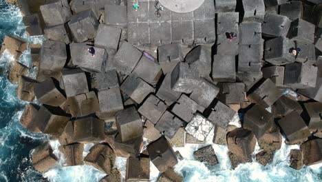 arial view of a seaway wall created using large blocks and a navigational beacon which allow boats to enter and exit safely