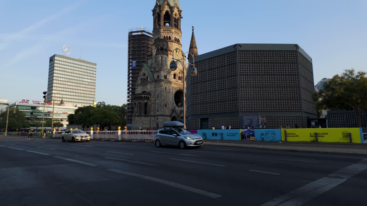 Street View Of Kaiser Wilhelm Memorial Church Ruins In Berlin, Germany. tilt-up reveal