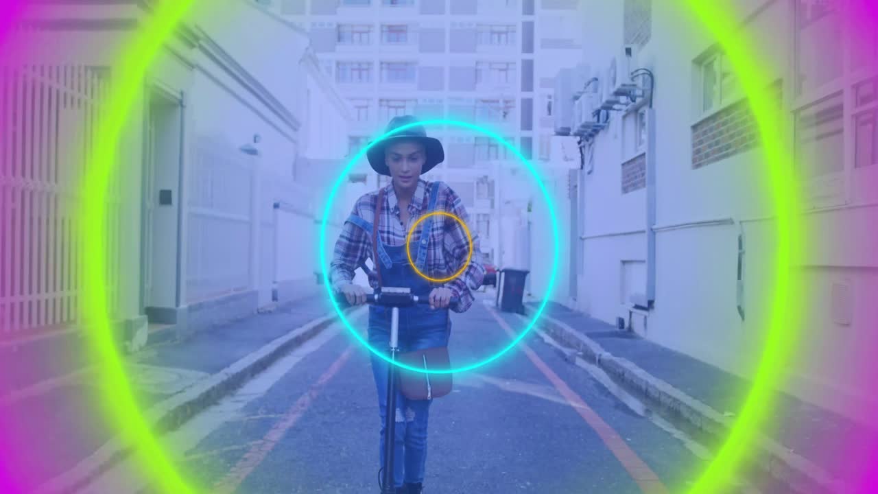 Animation of colorful circles over biracial woman using scooter on street