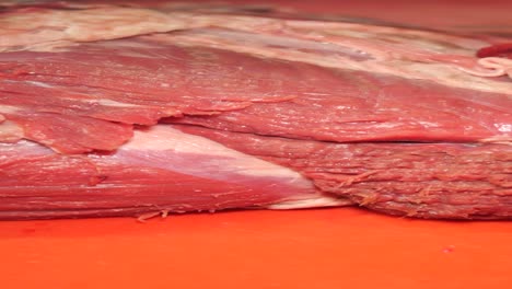 raw beef cuts on a cutting board