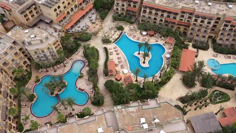 aerial view of a hotel complex and its surroundings on the maltese island of gozo