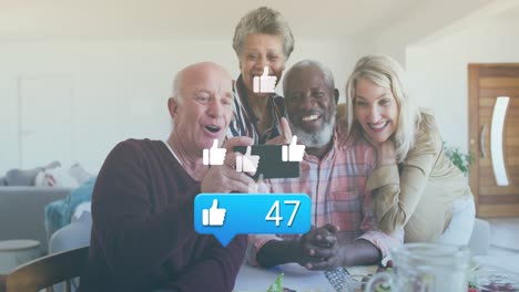Animation-of-media-icons-over-diverse-group-of-seniors-taking-selfie