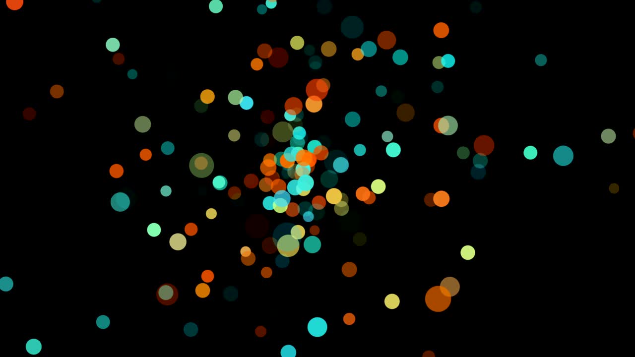 Abstract circle particle movement on isolated black background. Many green blue yellow red orange and brown round shape. Group of colorful spots. 4K footage video. Motion graphic design