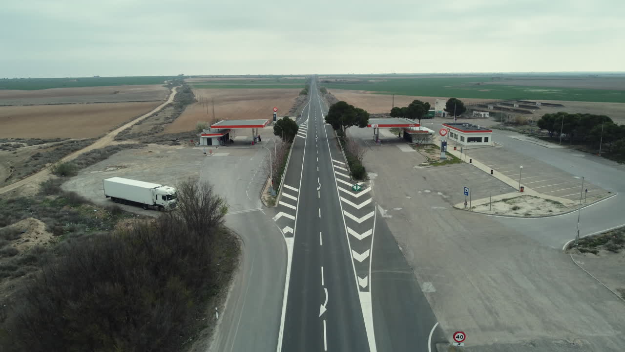 Empty Rural Highway with Gas Station
