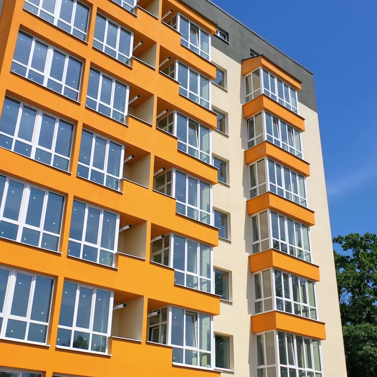 New modern apartment building. Aerial view of new house city multi-story apartment building