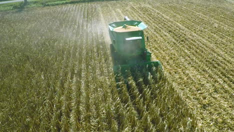 Excellent-aerial-over-a-rural-American-farm-with-corn-combine-harvester-at-work-3