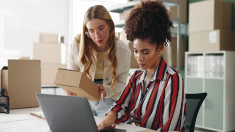 two women working in a small business office