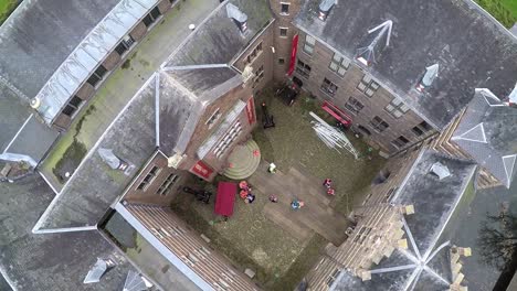 drone lifting up from castle courtyard