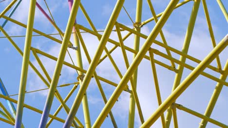 metallic multi-colored construction of a ferris wheel.
