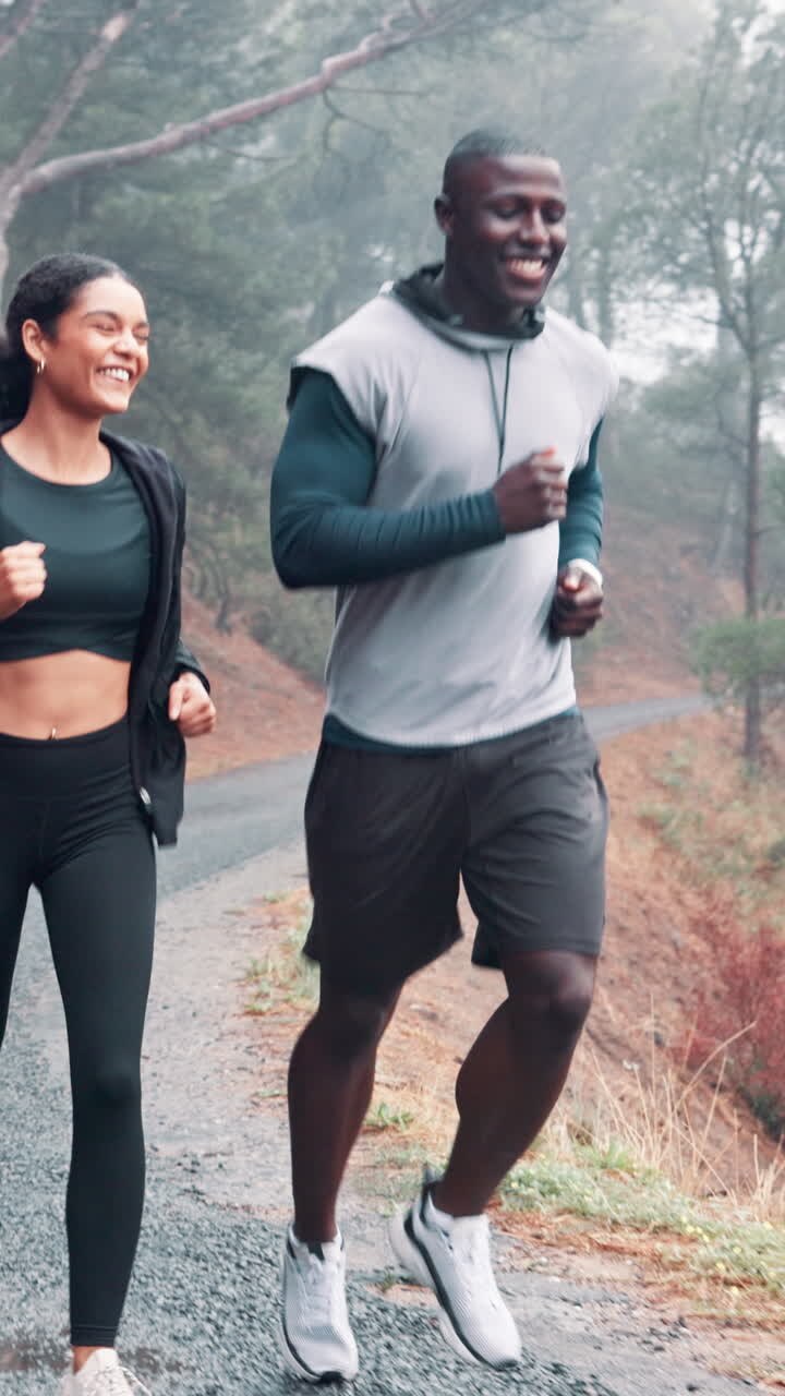 Happy Couple Running Together on a Scenic Outdoor Path