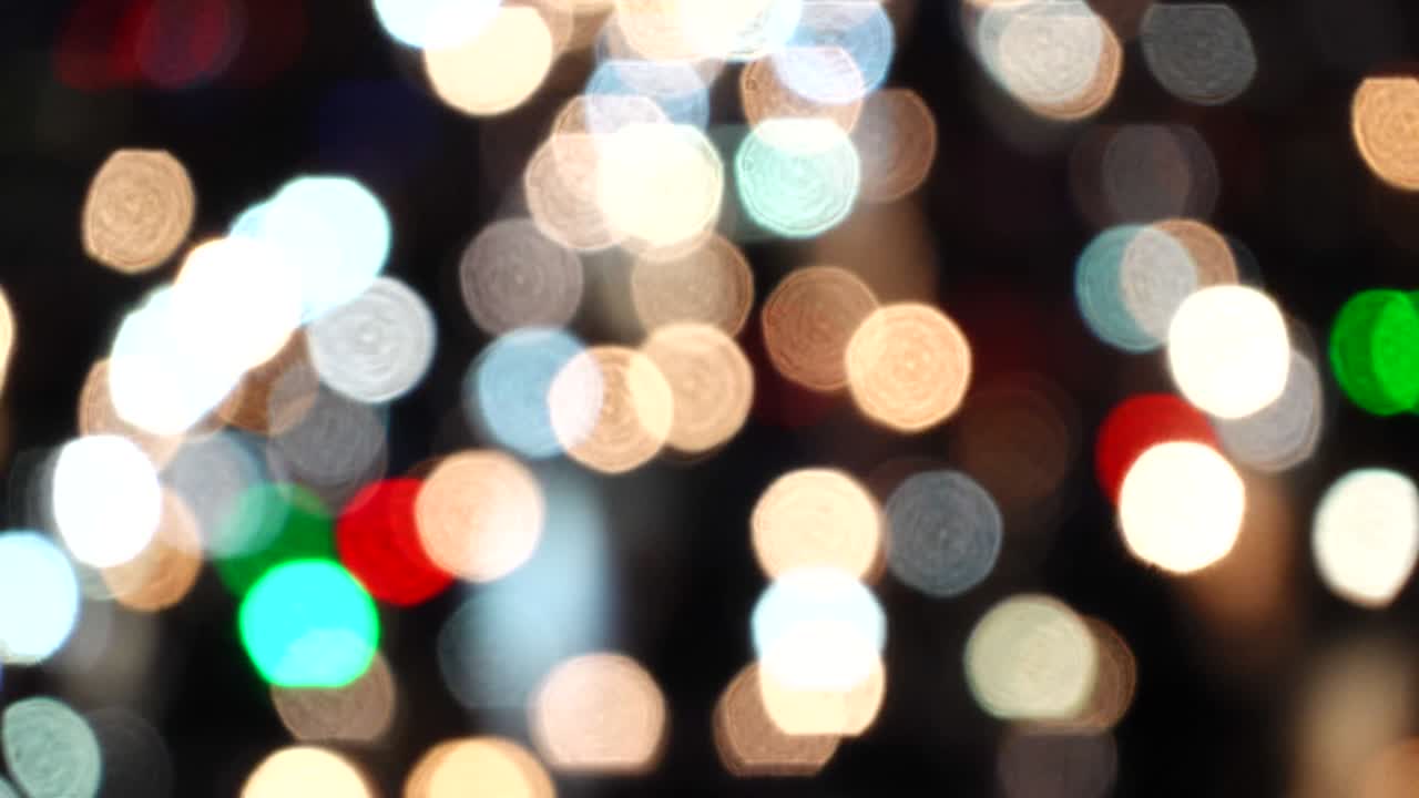 luces de la calle de la ciudad de la noche bokeh fondo abstracto