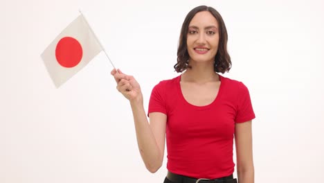 woman waving japanese flag