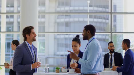 multi ethnic business people interacting with each other during a seminar 4k