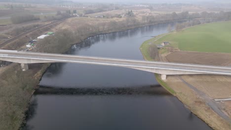 Aerial view of new Destiny Bridge across river Tay before opening. Looking North.