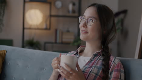 woman relaxing with a drink