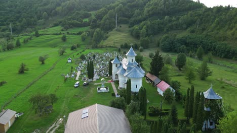 aerial view of an ancient church and cemetery in palanca, bacau county, western moldavia, romania