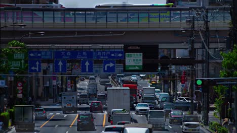 a timelapse of the traffic jam at the urban street in tokyo long shot