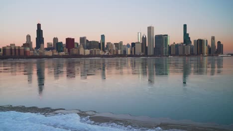 downtown chicago skyline during winter sunrise from museum campus "skyline walk" pan up