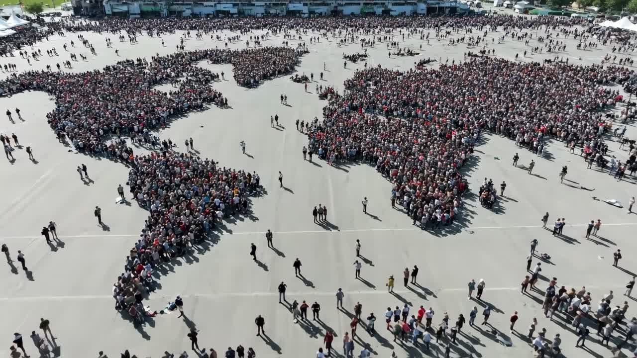 World Map Formed by a Large Crowd of People