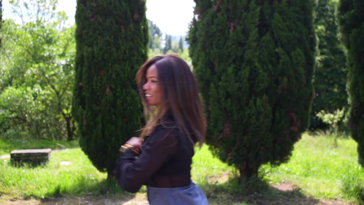 Woman dancing in a park