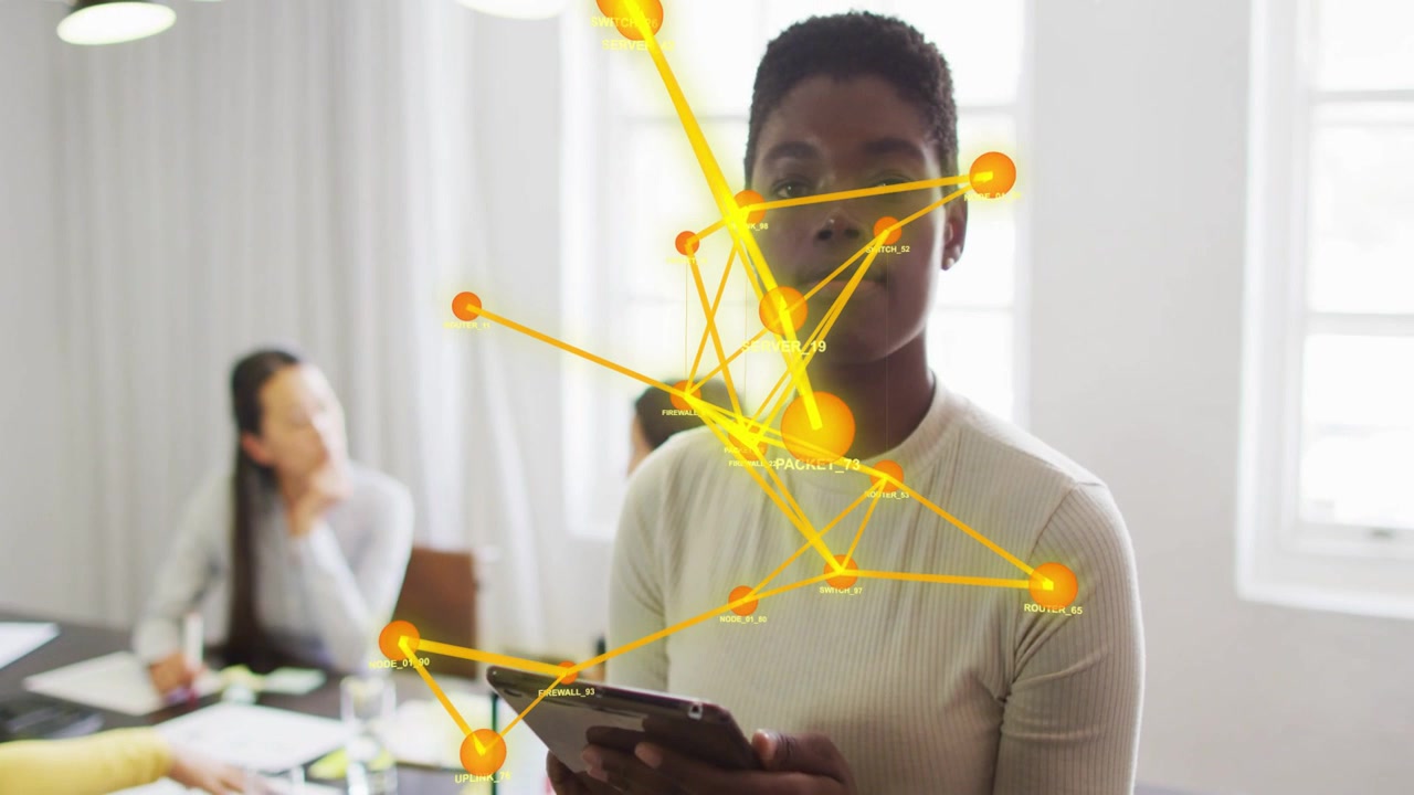 Presenter reading tablet in meeting, orange network graphic expanding to face, showing server flow