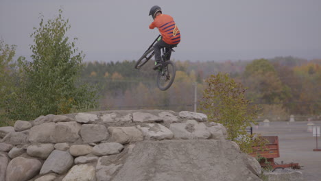 extreme sports mountain biking - dirt jumping tricks in slow motion