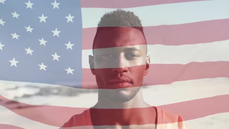 animación de la bandera de ee.uu. sobre un hombre afroamericano en la playa