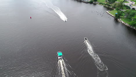 Aerial-video-of-3-boats-approaching-each-other-in-the-Providence-River-in-Providence,-RI