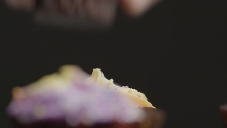 Close-Up-Shot-of-Cupcakes-Orbiting-Around-Central-Cupcake