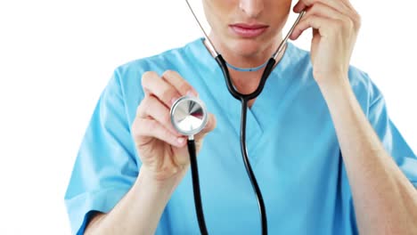 Close-up-of-male-surgeon-checking-with-stethoscope