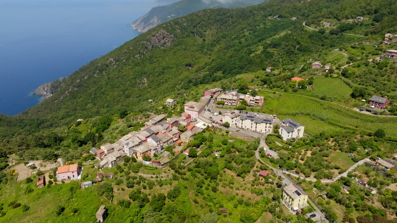 Panoramic drone shot of the Montaretto village, sunny day in Liguria, Italy