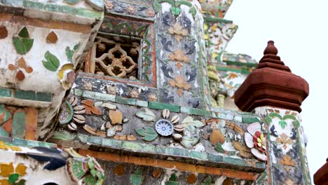 detailed view of wat arun's ornate mosaic tiles