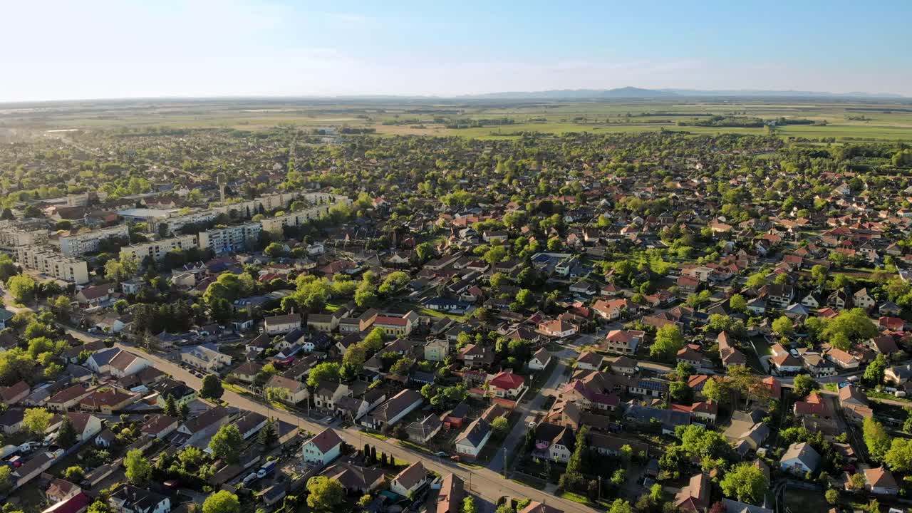 Panorama of a Hungarian town in the afternoon with Tokaj mountain in the background