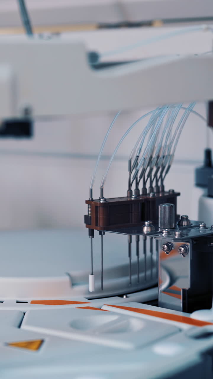 Modern medical equipment is working in the laboratory room at hospital. Work process of automated machine, blood and urine sample analysis in medical clinic. Vertical video