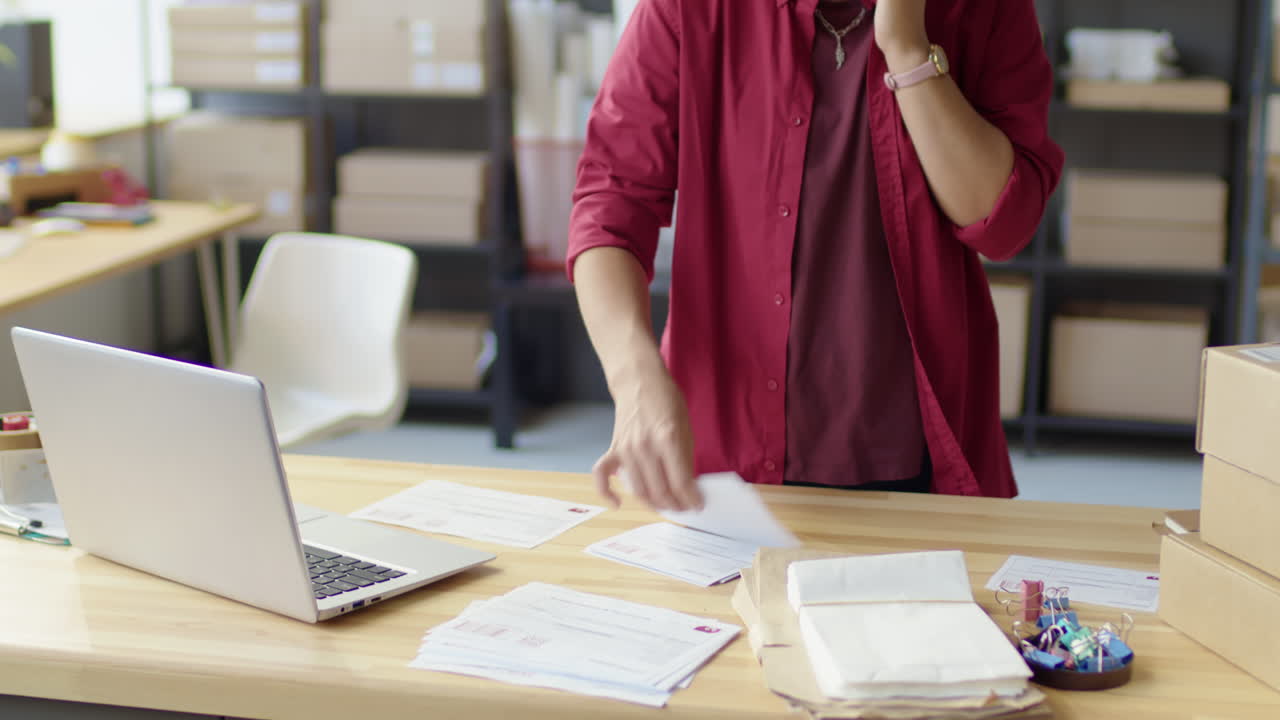 Female Manager Working in Delivery Service Office