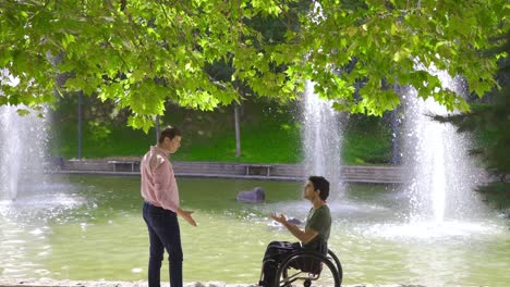 young man in wheelchair wins, rejoices.