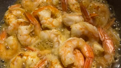 shrimp cooking in butter with steam