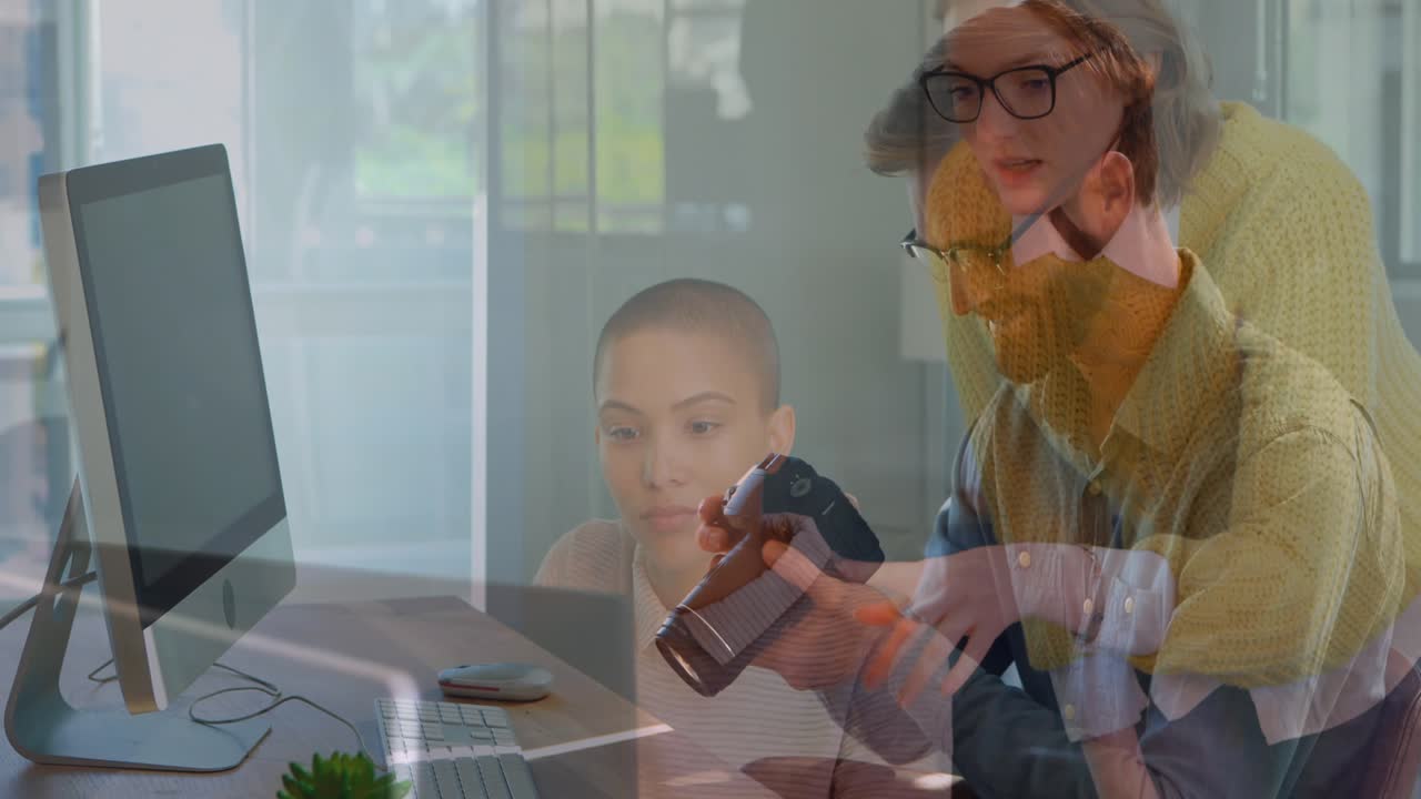 Animation of diverse business people talking over businessman using camera