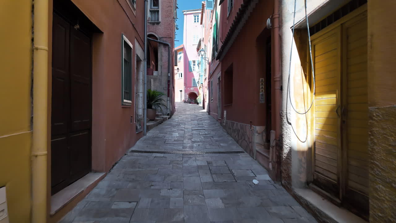A walk down the streets of Villefranche-sur-Mer, France near old buildings