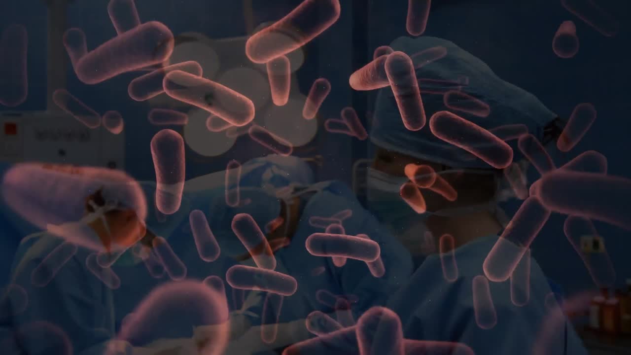 Animazione di cellule virali che fluttuano sopra dei chirurghi con mascherine