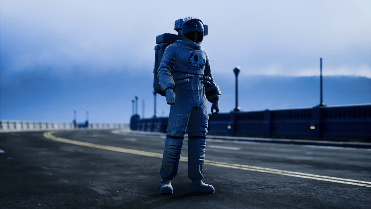 Astronaut standing on an empty road under a cloudy sky at twilight