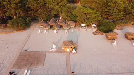 drone view of a hammock area to relax during vacations on a beach on the turquoise coast of turkey